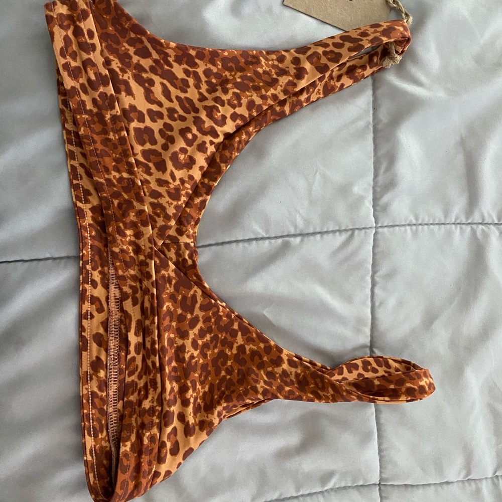 Stone Fox Swim Top. NEW, NEVER BEEN WORN WITH TAGS